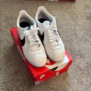 Nike Women’s White and Black Sneakers